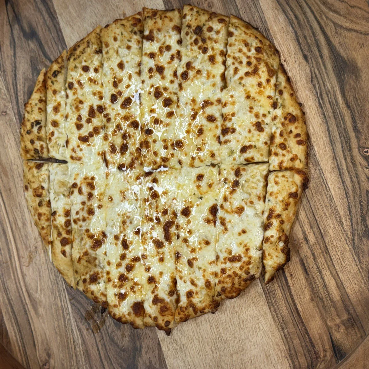 Cheese Pizza with melted cheese and charred crust, 100% halal halal pizza, ready for pickup or delivery in Providence